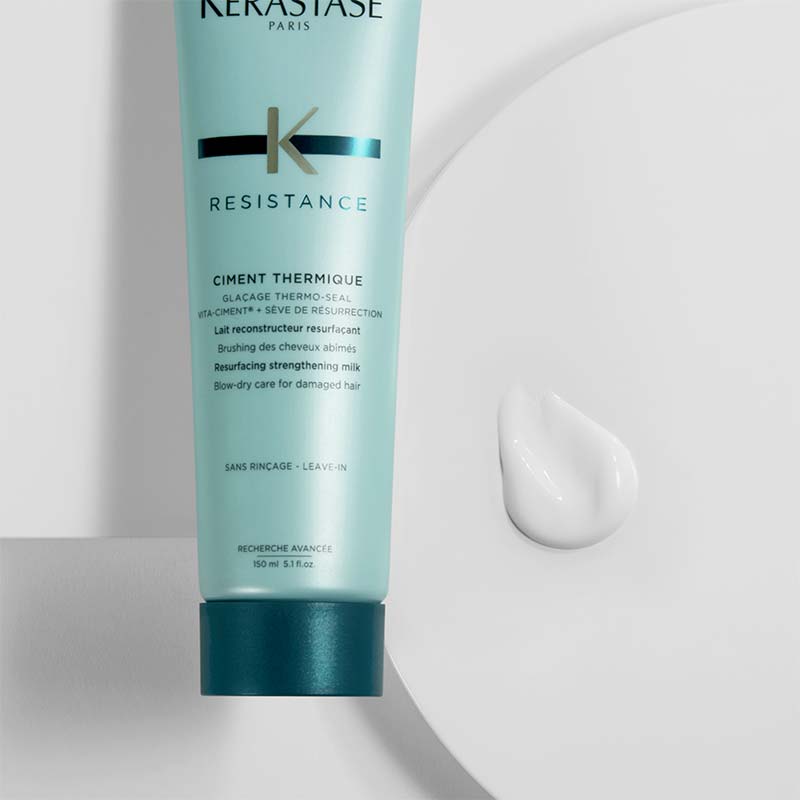 Kérastase Resistance Ciment Thermique Resurfacing Strengthening Milk | heat protector | hair repair | leave-in milk | Vita-Ciment formula | strengthening | resurfacing | damage-free | sleek | radiant locks.