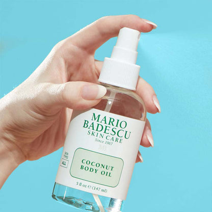 Mario Badescu, Mario Badescu Coconut Body Oil bottle, natural coconut body oil for glowing skin, moisturizing body oil with coconut oil, luxurious body oil for dry skin.