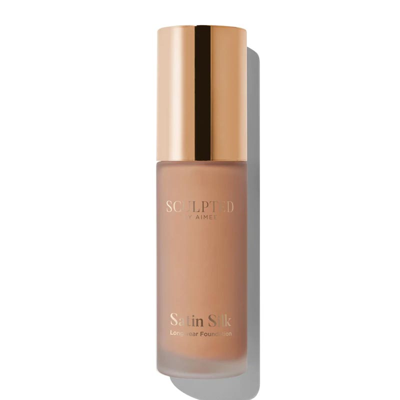 Sculpted By Aimee Connolly Satin Silk Longwear Foundation | radiant | medium to high coverage | flawless base | feels lightweight | skin | satin silk finish | glides smoothly | complexion | won't clog pores | Infused with skin-loving ingredients | hydrating formula | nourished | plump | foundation | sit comfortably | 8+ hours.