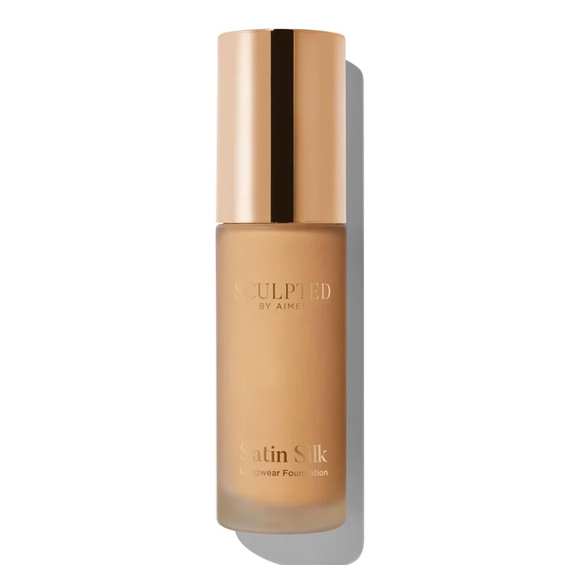 Sculpted By Aimee Connolly Satin Silk Longwear Foundation | radiant | medium to high coverage | flawless base | feels lightweight | skin | satin silk finish | glides smoothly | complexion | won't clog pores | Infused with skin-loving ingredients | hydrating formula | nourished | plump | foundation | sit comfortably | 8+ hours.