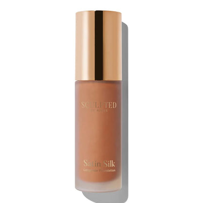 Sculpted By Aimee Connolly Satin Silk Longwear Foundation | radiant | medium to high coverage | flawless base | feels lightweight | skin | satin silk finish | glides smoothly | complexion | won't clog pores | Infused with skin-loving ingredients | hydrating formula | nourished | plump | foundation | sit comfortably | 8+ hours.