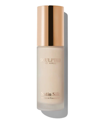 Sculpted By Aimee Connolly Satin Silk Longwear Foundation | radiant | medium to high coverage | flawless base | feels lightweight | skin | satin silk finish | glides smoothly | complexion | won't clog pores | Infused with skin-loving ingredients | hydrating formula | nourished | plump | foundation | sit comfortably | 8+ hours.