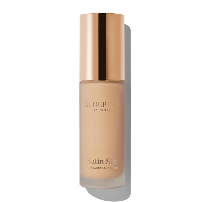 Sculpted By Aimee Connolly Satin Silk Longwear Foundation | radiant | medium to high coverage | flawless base | feels lightweight | skin | satin silk finish | glides smoothly | complexion | won't clog pores | Infused with skin-loving ingredients | hydrating formula | nourished | plump | foundation | sit comfortably | 8+ hours.