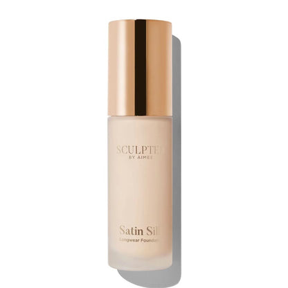 Sculpted By Aimee Connolly Satin Silk Longwear Foundation | radiant | medium to high coverage | flawless base | feels lightweight | skin | satin silk finish | glides smoothly | complexion | won't clog pores | Infused with skin-loving ingredients | hydrating formula | nourished | plump | foundation | sit comfortably | 8+ hours.