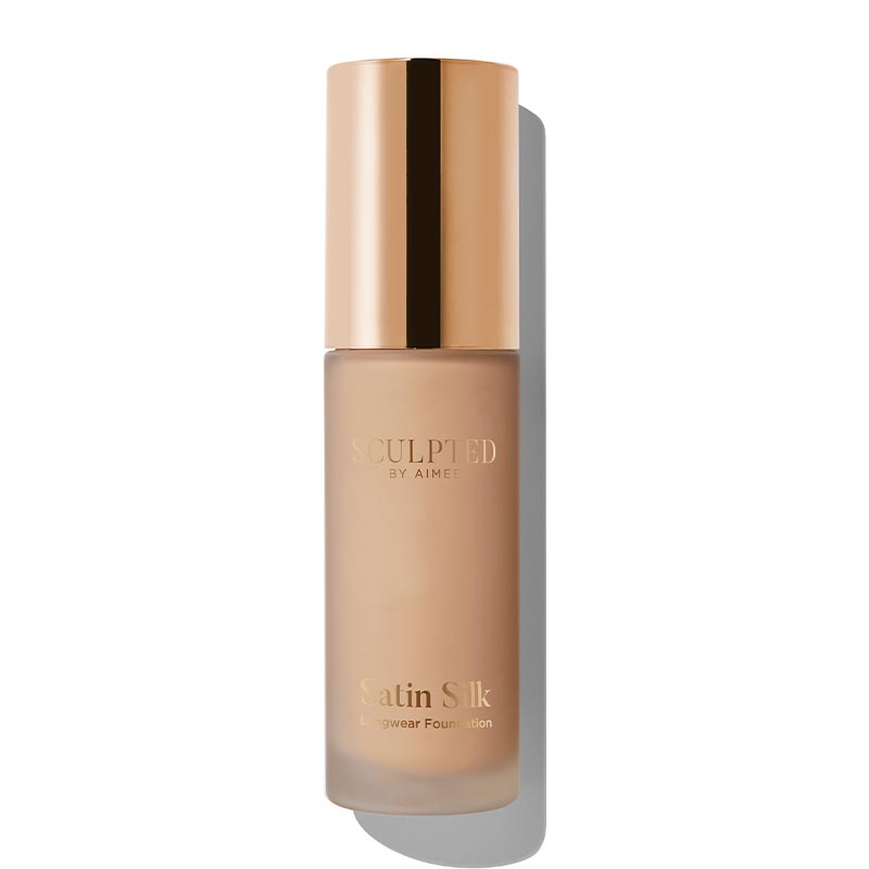 Sculpted By Aimee Connolly Satin Silk Longwear Foundation | radiant | medium to high coverage | flawless base | feels lightweight | skin | satin silk finish | glides smoothly | complexion | won't clog pores | Infused with skin-loving ingredients | hydrating formula | nourished | plump | foundation | sit comfortably | 8+ hours.