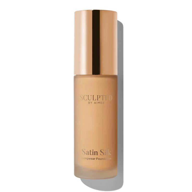 Sculpted By Aimee Connolly Satin Silk Longwear Foundation | radiant | medium to high coverage | flawless base | feels lightweight | skin | satin silk finish | glides smoothly | complexion | won't clog pores | Infused with skin-loving ingredients | hydrating formula | nourished | plump | foundation | sit comfortably | 8+ hours.