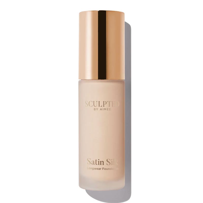 Sculpted By Aimee Connolly Satin Silk Longwear Foundation | radiant | medium to high coverage | flawless base | feels lightweight | skin | satin silk finish | glides smoothly | complexion | won't clog pores | Infused with skin-loving ingredients | hydrating formula | nourished | plump | foundation | sit comfortably | 8+ hours.