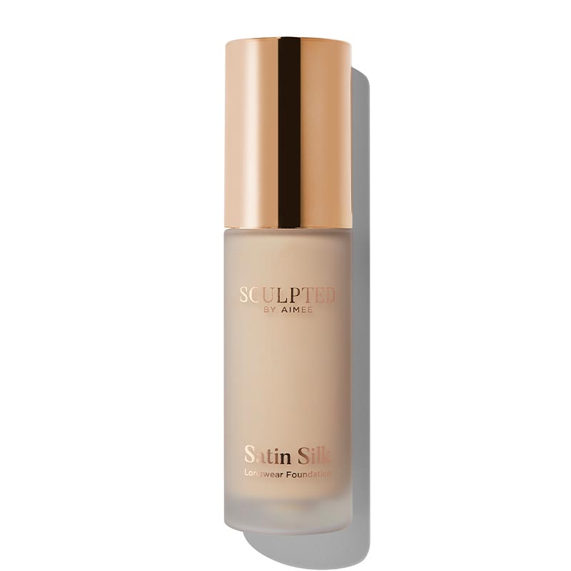 Sculpted By Aimee Connolly Satin Silk Longwear Foundation | radiant | medium to high coverage | flawless base | feels lightweight | skin | satin silk finish | glides smoothly | complexion | won't clog pores | Infused with skin-loving ingredients | hydrating formula | nourished | plump | foundation | sit comfortably | 8+ hours.